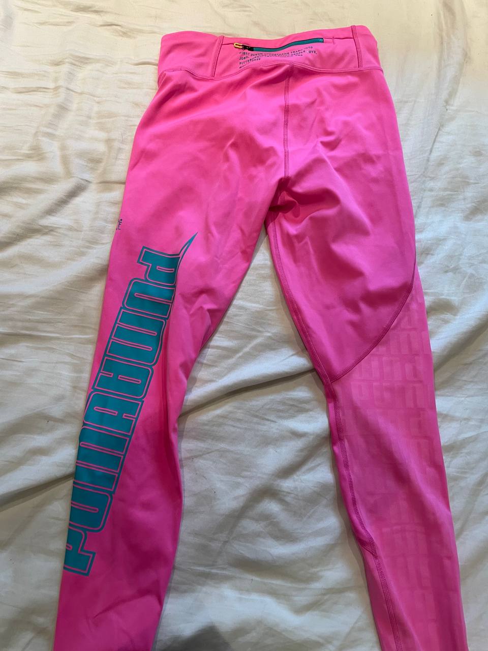 Спортивные леггинсы Puma со светоотражающими и фирменными деталями Puma Active Pink